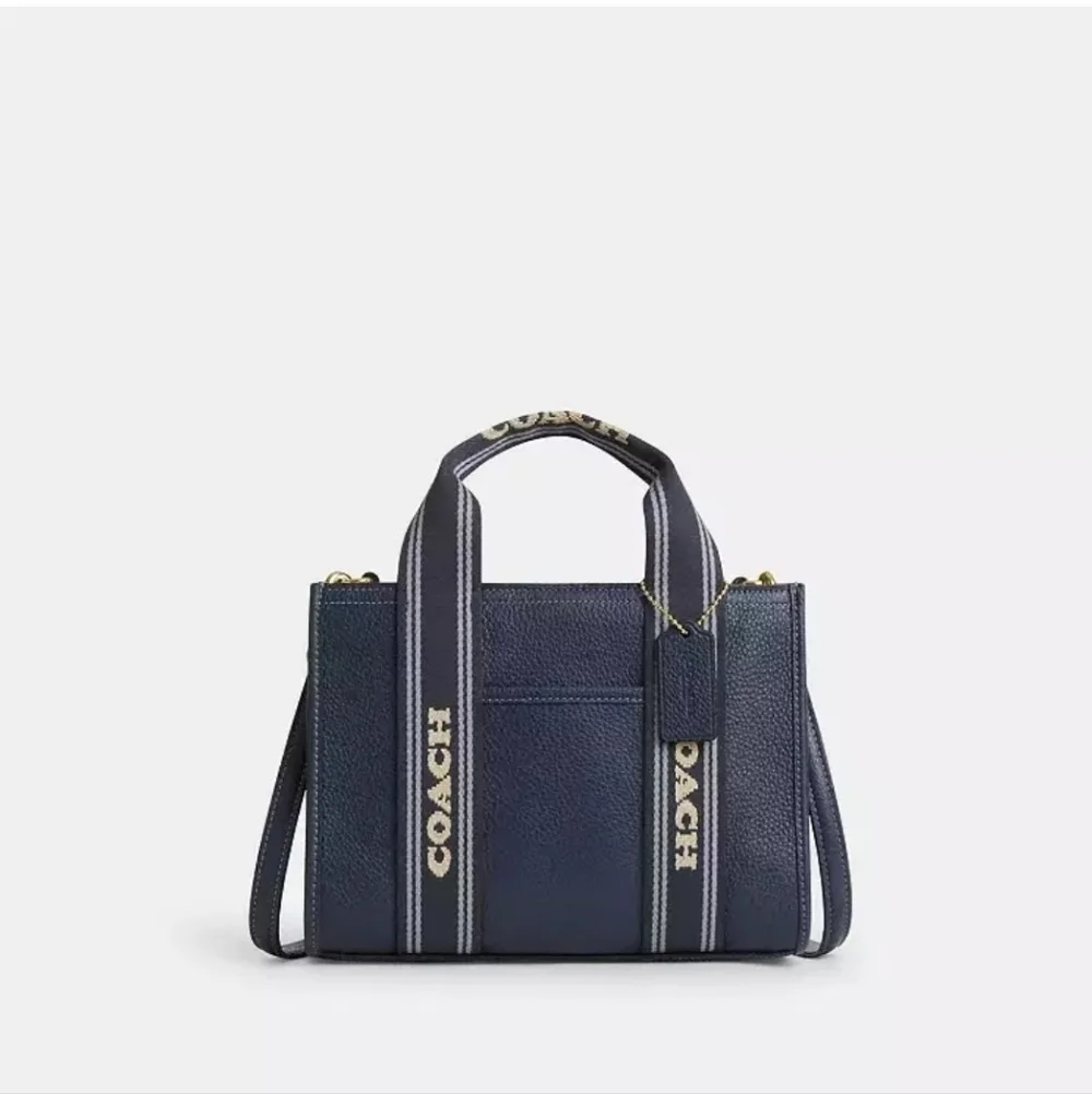 Coach Leather Smith Tote 24 with Striped Handles.